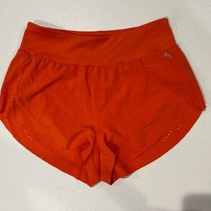 Orange running shorts